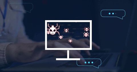 Hands typing on laptop with malware warning overlay and cyber threat icons