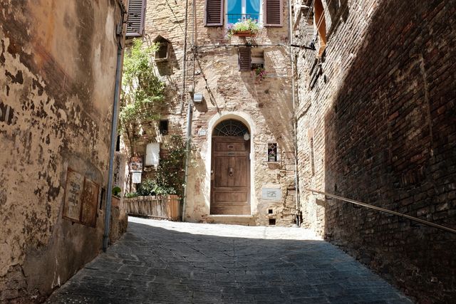 Stunning Medieval Stone Alleyway with Rustic Architecture in Italy - Download Free Stock Photos Pikwizard.com