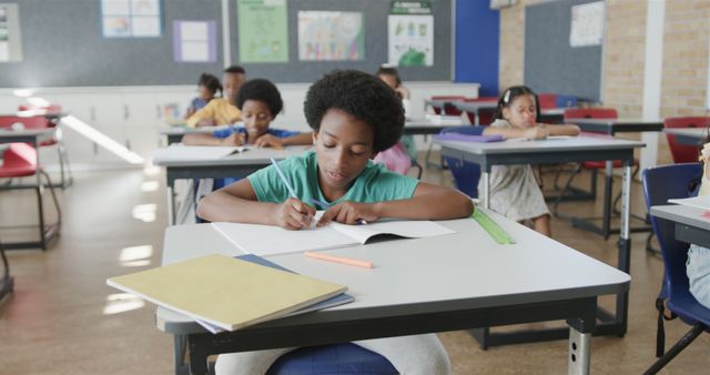 Focused Schoolchildren Studying in Classroom Environment - Download Free Stock Images Pikwizard.com