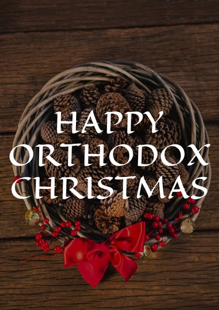 Composition of happy orthodox christmas text over pine cones basket at table. orthodox new year, greeting, tradition and holiday.