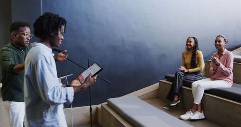 Award ceremony celebration in modern office setting