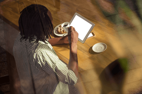 man using transparent digital tablet drinking coffee - Download Free Stock Videos Pikwizard.com