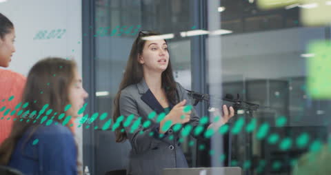 Team Collaborating in Office with Financial Data Overlay Details