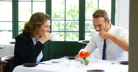 Business Colleagues Enjoying Coffee in Restaurant - Download Free Stock Images Pikwizard.com