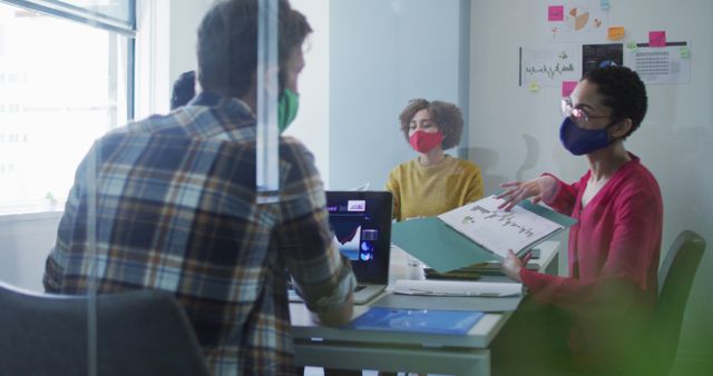 Team in Masks Having Productive Meeting in Office - Download Free Stock Images Pikwizard.com