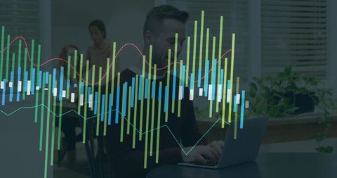 Remote data analyst typing on laptop with digital charts overlay in modern home office