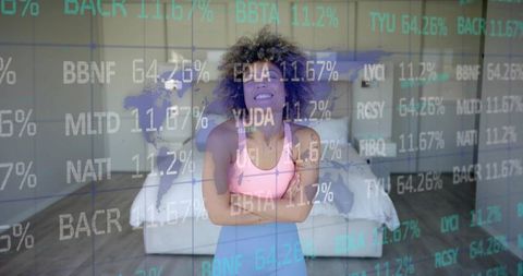Smiling woman in pink sportswear standing confidently in minimalist bedroom with data overlay