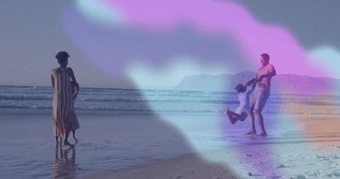 Family Bonding by the Beach with Colorful Light Overlay