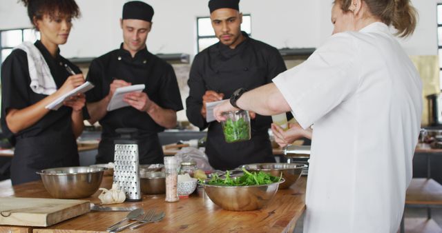 Professional Chefs Receiving Kitchen Training with Instructor - Download Free Stock Images Pikwizard.com