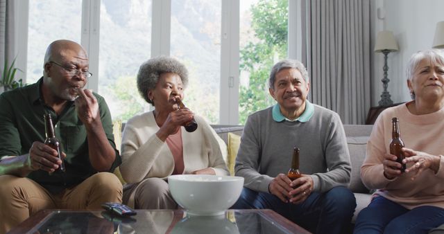 Senior Friends Enjoying Beer and Conversation at Cozy Gathering - Download Free Stock Images Pikwizard.com