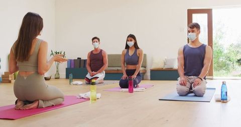 Yoga Class with Masks Maintaining Safety During Pandemic - Download Free Stock Images Pikwizard.com