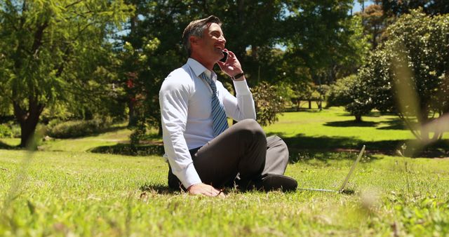 Businessman Working Remotely Outdoors on Sunny Day - Download Free Stock Images Pikwizard.com