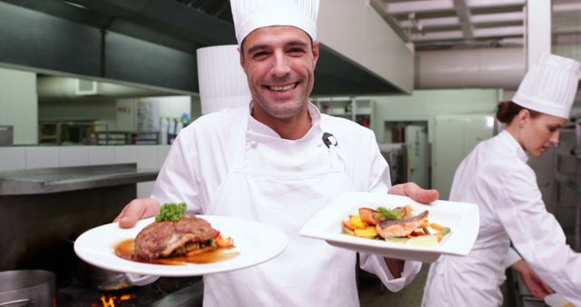 Smiling Chef Presenting Dishes in Restaurant Kitchen - Download Free Stock Images Pikwizard.com