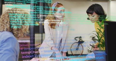 Leading team through collaborative code review and brainstorming in modern startup office