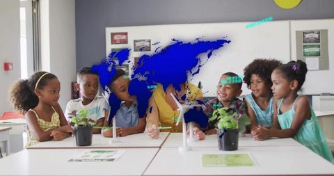 Teacher Demonstrating Wind Turbine with Students in Hands-on Renewable Energy Lesson
