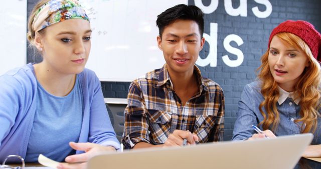 Diverse Students Collaborating on Group Project - Download Free Stock Images Pikwizard.com