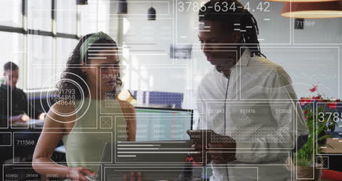 Colleagues Collaborating with Data Visualization Overlay