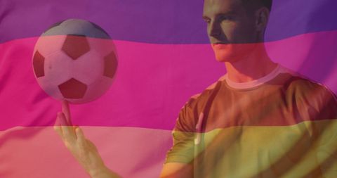 Soccer player juggling ball against german flag
