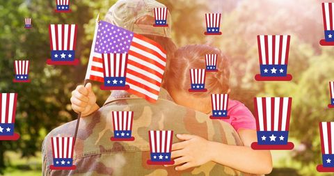 Soldier Embraces Daughter Holding American Flag