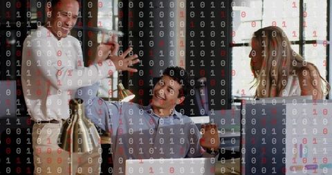 Team collaborating in modern coworking office with digital binary overlay and high-five