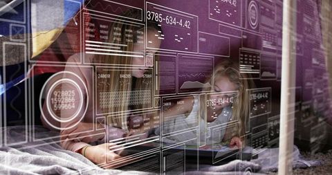 Mother and daughter reading in blanket fort with tablet and futuristic hud overlays