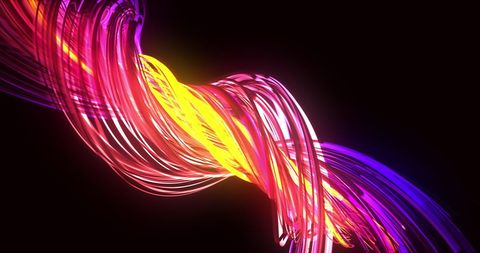 Vibrant Light Trails in Motion on Dark Background