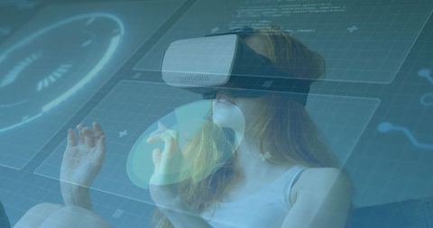 Woman exploring futuristic hud interface with vr headset