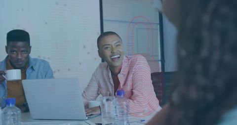 Diverse Team Collaborating in Modern Office Meeting Space