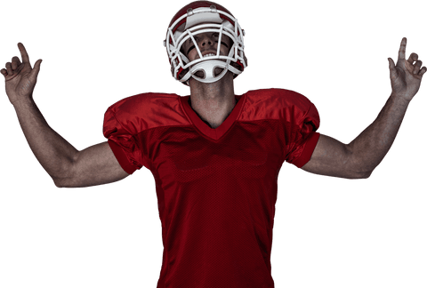 Victorious rugby player celebrating with raised arms