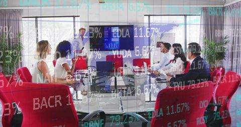 Diverse business team reviewing data in meeting