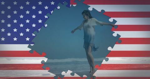 Woman Dancing on Beach with American Flag and Puzzle Concept