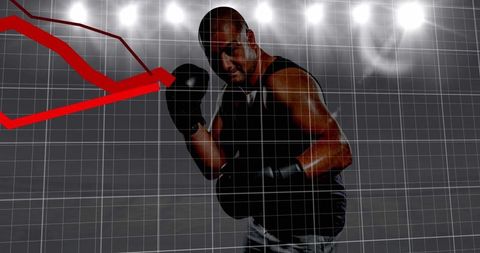 Boxer against graphs representing financial challenges