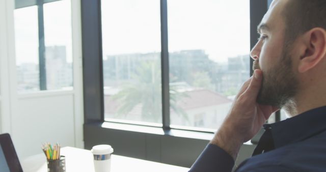 Businessman Thinking in Modern Office with City View - Download Free Stock Images Pikwizard.com