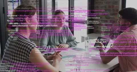 Three colleagues discussing code review around laptop with purple code overlay in modern office