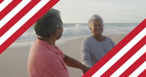 Senior Couple Dancing Joyfully on Scenic Beach