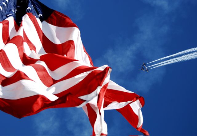 American Flag Waving with Fighter Jets Flying Overhead - Download Free Stock Photos Pikwizard.com