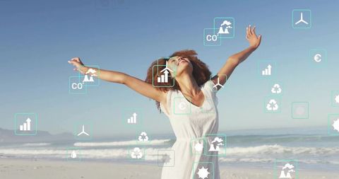 Woman celebrating sustainable future on beach surrounded by renewable energy icons