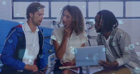 Diverse Coworkers Collaborating on Tech Project