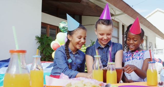 Happy Kids Enjoying Birthday Party With Drinks and Decorations - Download Free Stock Images Pikwizard.com