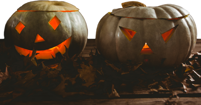 Transparent Halloween Jack O' Lanterns on Wooden Table with Autumn Leaves - Download Free Stock Videos Pikwizard.com