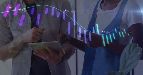 Business finance analysis with colleagues using tablet