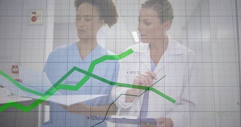 Medical Professionals Analyzing Data with Graph Overlay in Hospital