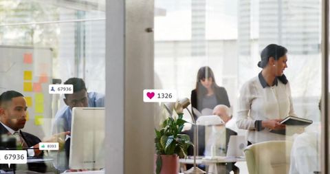 Professional Team Engaged in Work with Digital Interaction Icons