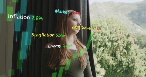 Young woman gazing out window with ar financial overlays showing inflation, market, gdp