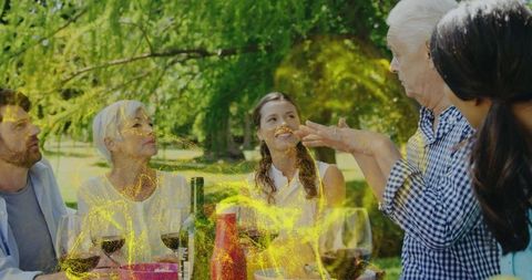 Family Spending Quality Time During Outdoor Picnic