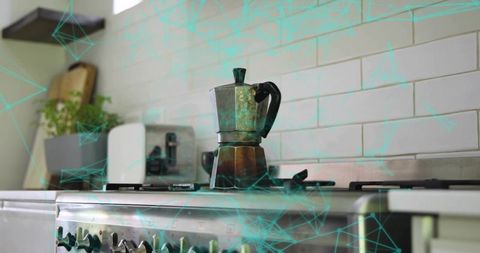 Tarnished moka pot sitting on stainless gas stove with teal digital overlay