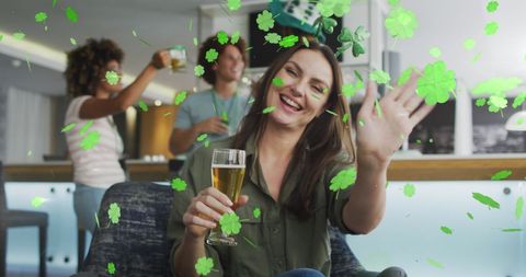 Friends Celebrating St. Patrick's Day with Beer and Cheers