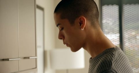 Thoughtful Biracial Man Contemplating at Home