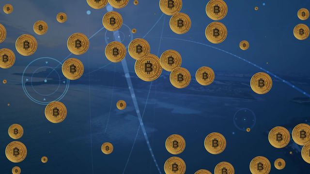 The video shows multiple Bitcoin coins floating over a blue digital blockchain network background with visual connections. Ideal for illustrating cryptocurrency, blockchain technology, online finance concepts, or digital currency-related articles.