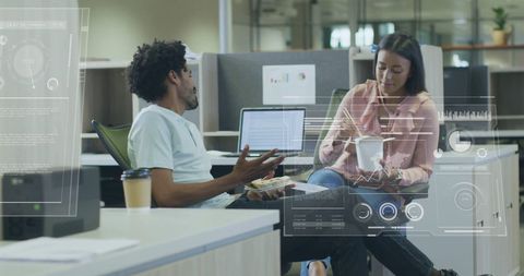 Diverse Colleagues Analyzing Data with Innovative Technologies